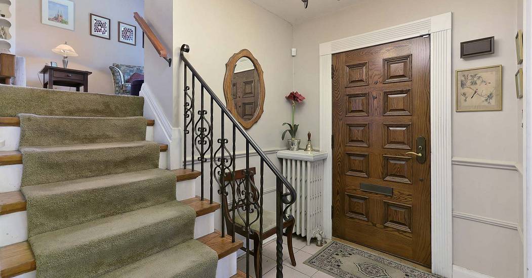 006-The-Foyer-With-Classic-Hardwood-Entry-Door.jpg